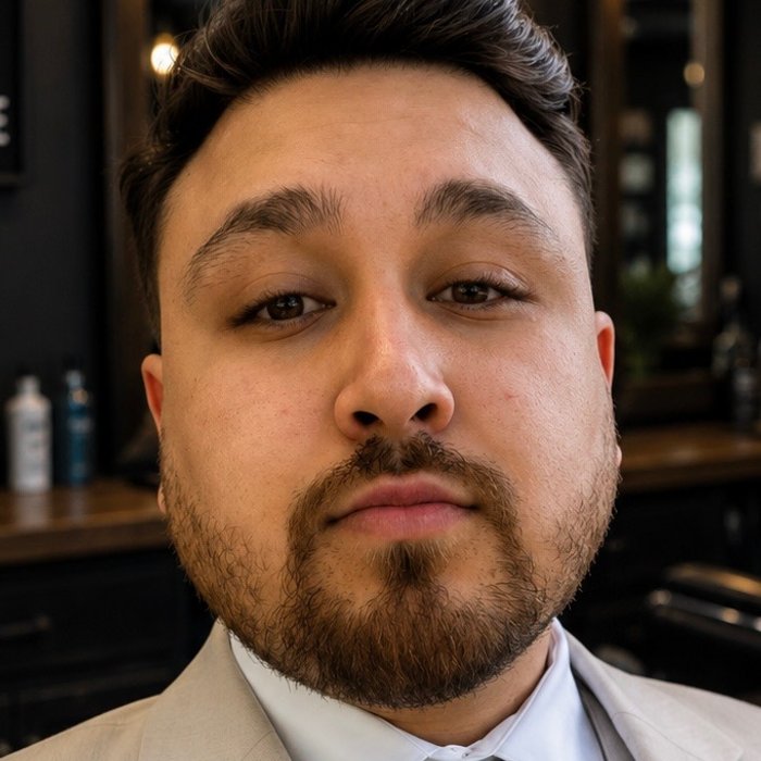 Gilbert, barber at Goodfellas Champlin