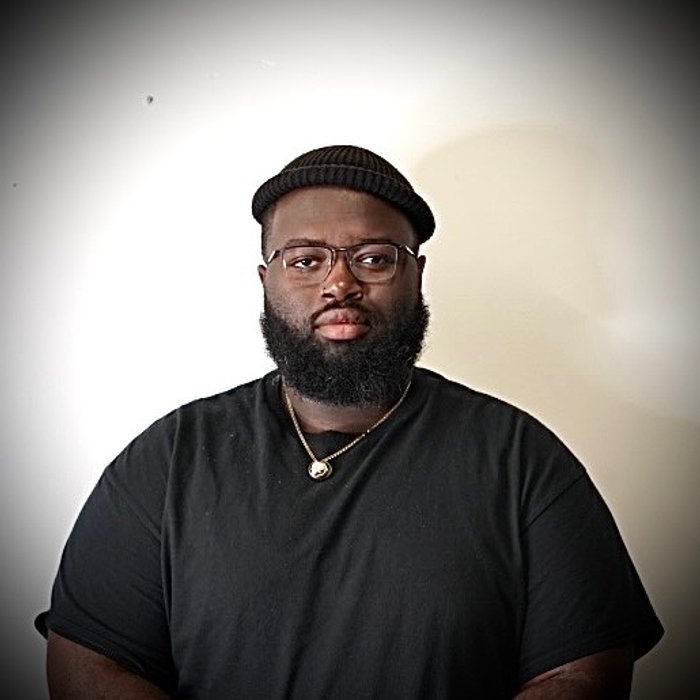 De'Vale, barber at Goodfellas Uptown Mpls