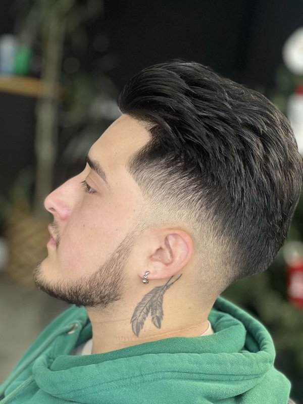 High Fade Slick Back haircut at Goodfellas Barber Studio